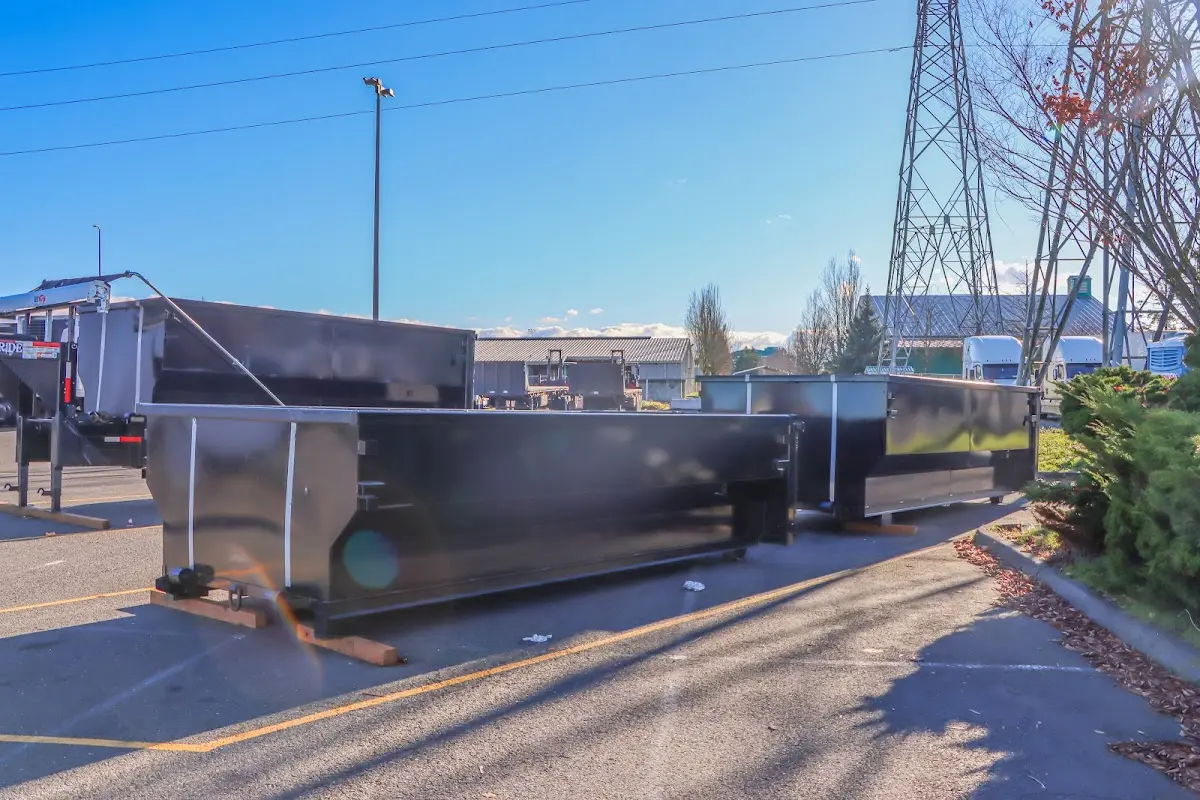 Roll-off dumpster ready for waste disposal at job site for Concrete Dumpster Rental in Redford